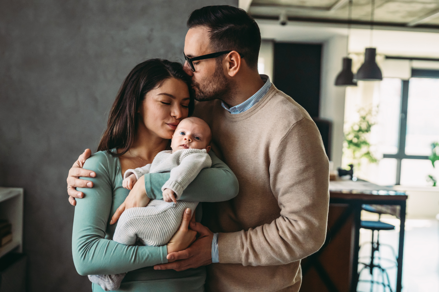 Mother, dad, and newborn baby.